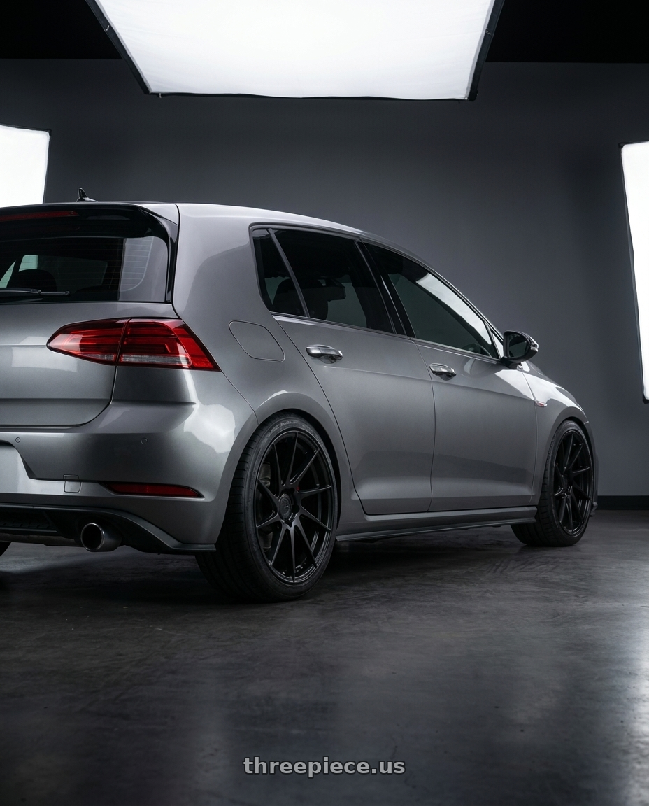 2019 Volkswagen GTI MK7 with Aodhan AH09 5x112 18x8.5 +35 Matte Black wheels rear three quarter view square tires