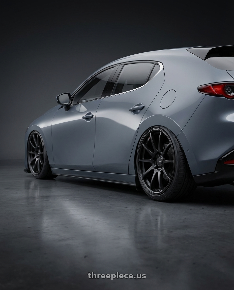2023 Mazda Mazda3 Turbo with Ssr Gtv02 5x114.3 18x8.5+48  FLAT BLACK wheels rear three quarter view slight stretch tires