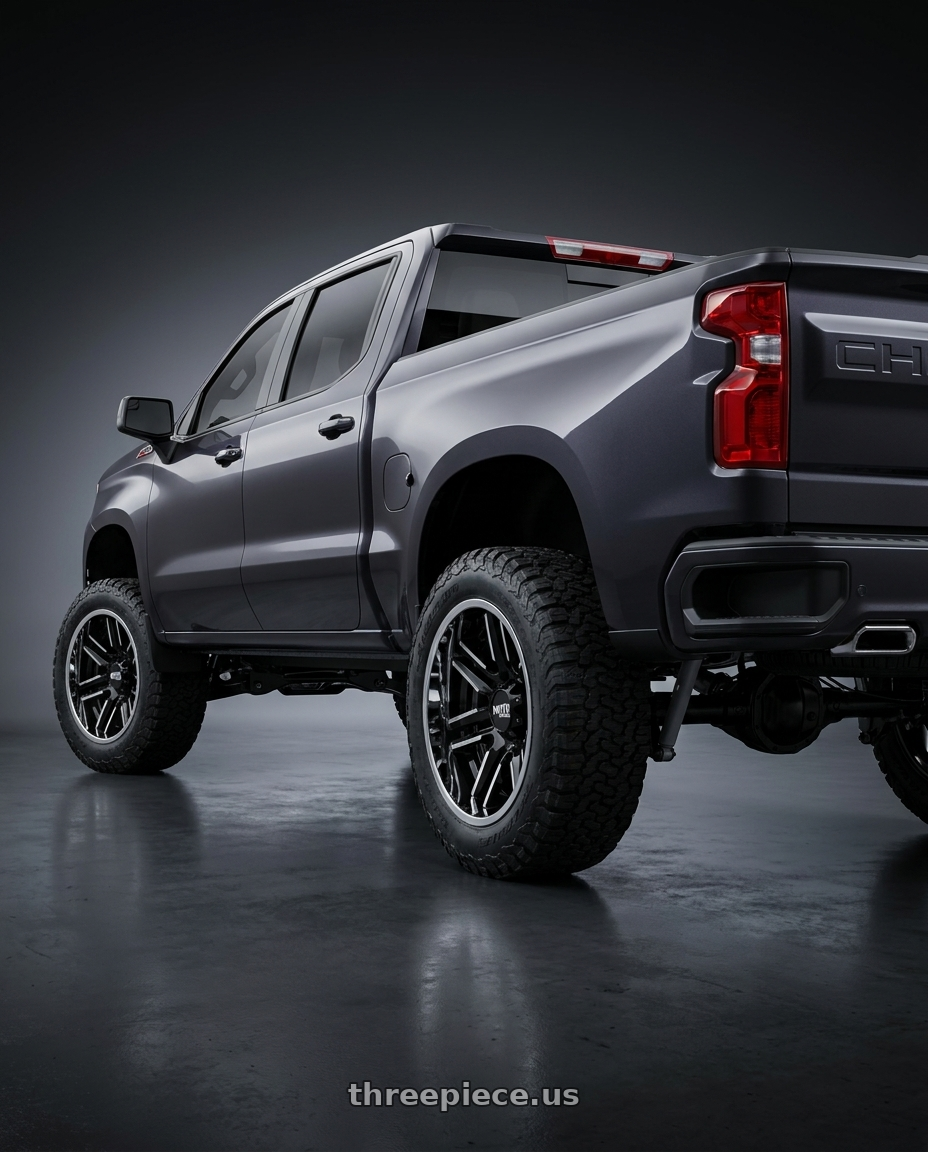 2023 Chevrolet Silverado 1500 with Moto Metal MO202 6X139.7 22X10 -18 GLOSS BLACK MACHINED CENTER CHROME LIP wheels rear three quarter view meaty tires
