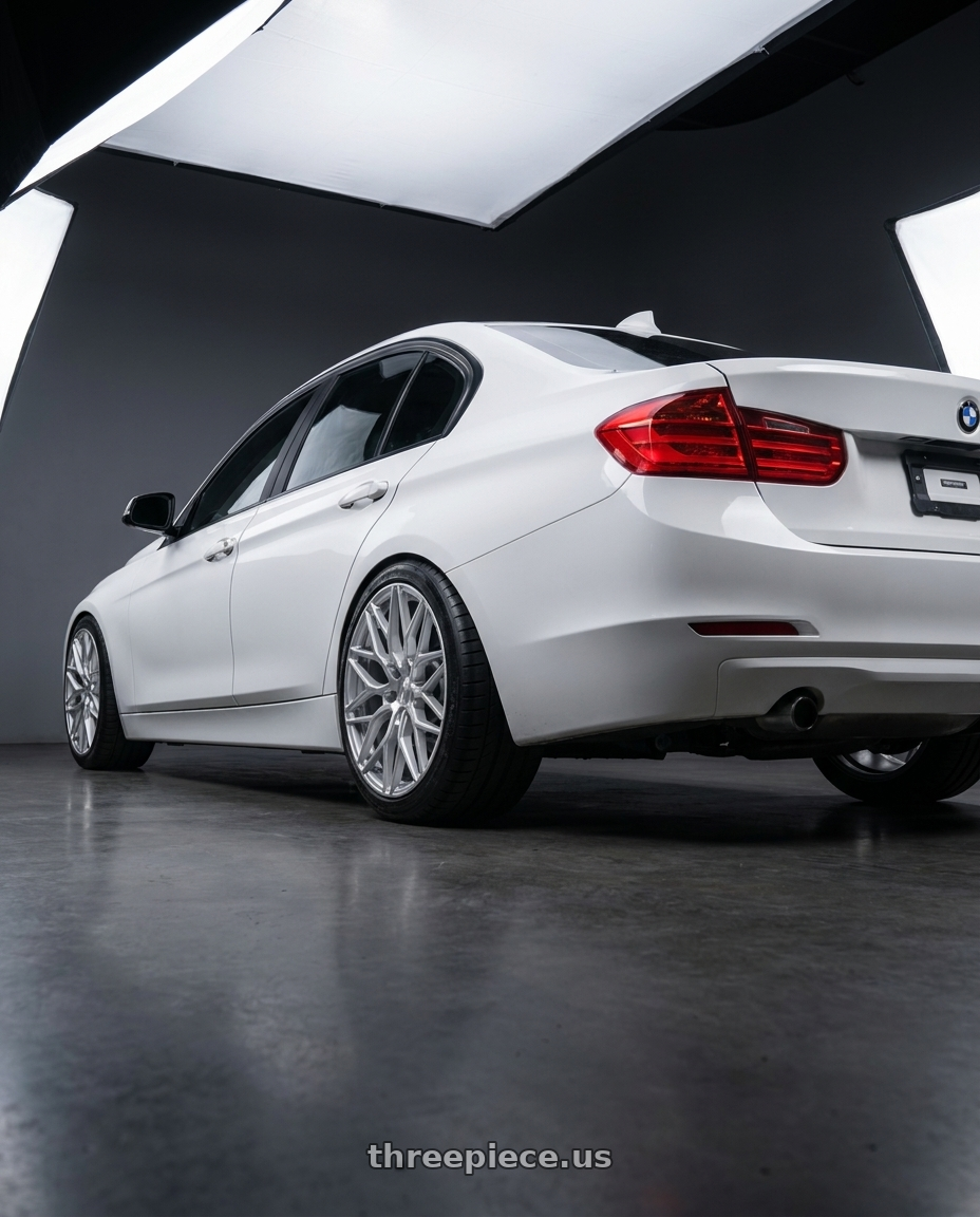 2014 BMW 320i with 1AV ZX12 5x115 19x8.5 +40 Silver wheels rear three quarter view square tires