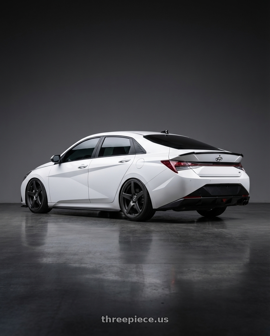 2024 Hyundai Elantra N with Forgestar CF5 5x114.3 19x9.5 +29 Satin Black wheels rear three quarter view slight stretch tires