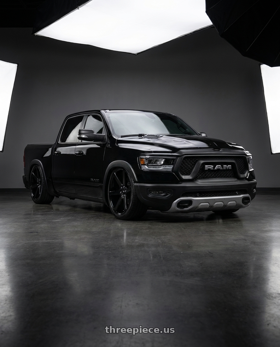 2023 Ram 1500 with Niche 1PC M230 FUTURE 6X139.7 24X10 +20 GLOSS BLACK wheels front three quarter view slammed stance