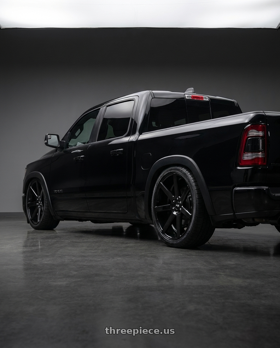 2023 Ram 1500 with Niche 1PC M230 FUTURE 6X139.7 24X10 +20 GLOSS BLACK wheels rear three quarter view slight stretch tires