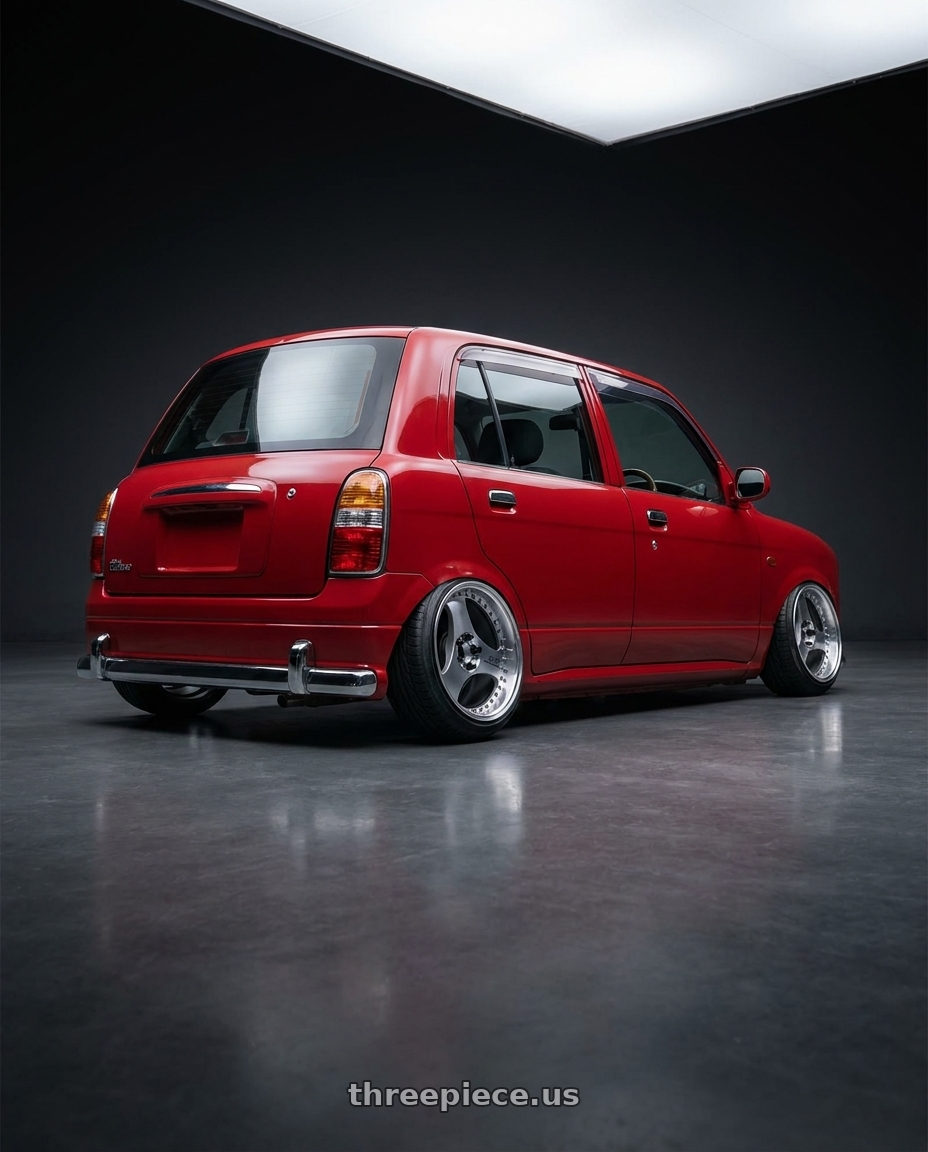 2000 Daihatsu Mira Gino 4 door with Advan Racing ONI2 PROGRESSIVE 5x112 20x9.5 +25 MACHINING & DIAMOND CUT wheels rear three quarter view extreme stretch tires