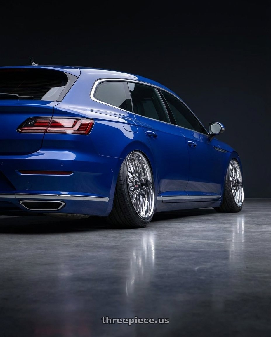 2021 VW Arteon with Cray MANTA 5X120.65 18X9 +50 CHROME wheels rear three quarter view extreme stretch tires