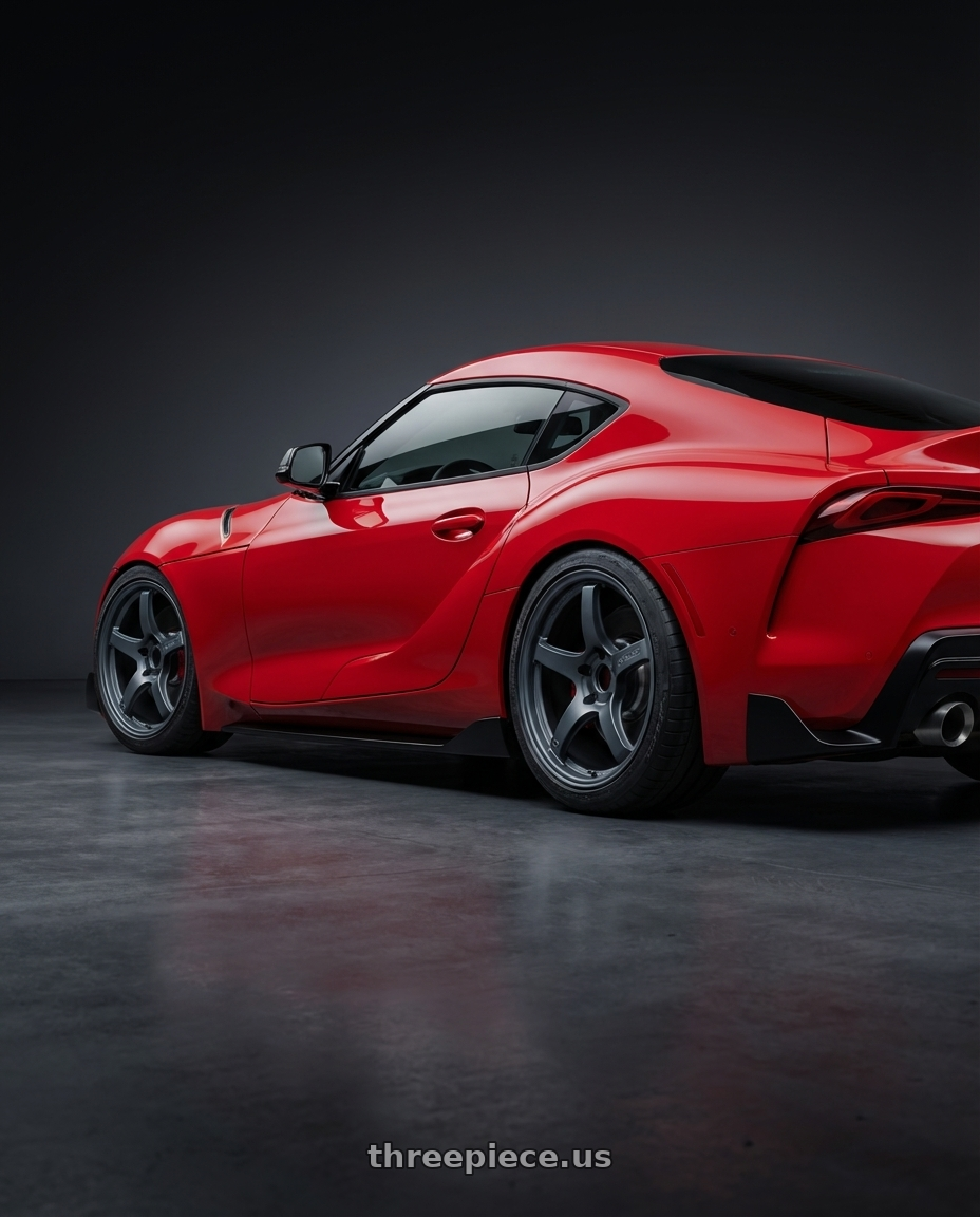 2023 Toyota GR Supra with Gram Lights 57CR 5x112 19x9.5+45 Gunblue II wheels rear three quarter view square tires