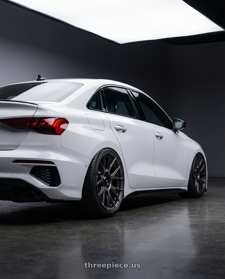 2024 Audi S3 8Y with Konig Ampliform 5x112 19x8.5+32 Dark Metallic Graphite wheels rear three quarter view slight stretch tires