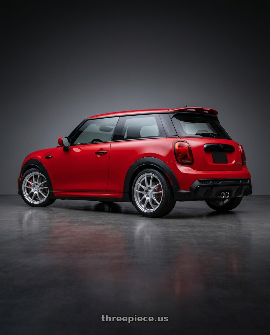 2025 mini 2 door hatch with Enkei PF01 5x112 18x8+45 Silver wheels rear three quarter view square tires