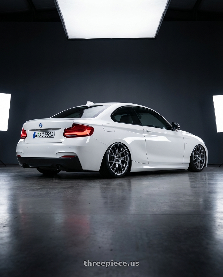 2018 BMW 2 Series F22 with BBS CH-R 5x120 19x9.5 +35 Satin Titanium Polished Rim Protector wheels rear three quarter view slight stretch tires