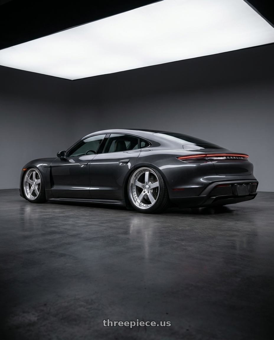2021 Porsche taycan with Work Equip E05 5x108 19x10.5+-17 o disk Feinheit Silver 2 wheels rear three quarter view slight stretch tires