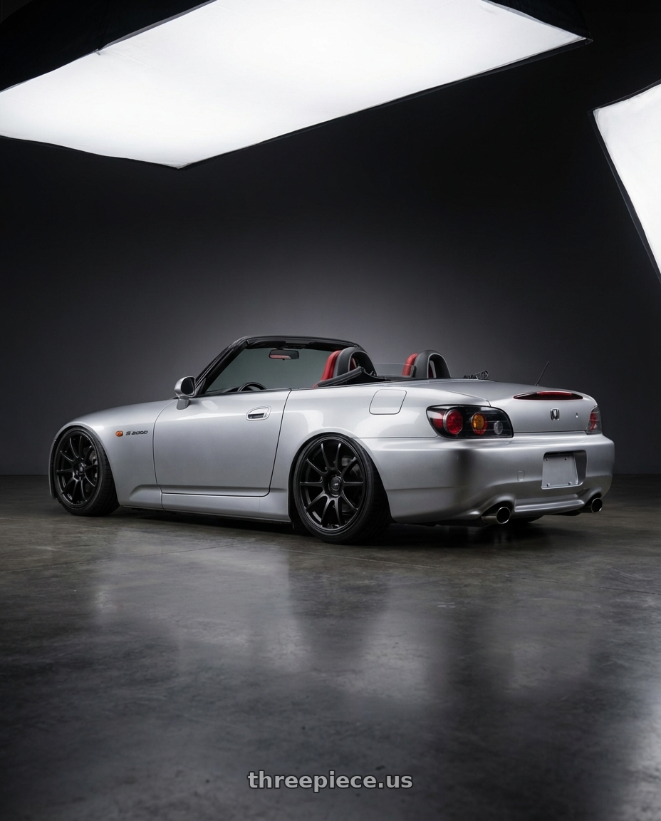 2009 Honda S2000 with Ssr Gtv02 5x114.3 18x8+35  FLAT BLACK wheels rear three quarter view slight stretch tires
