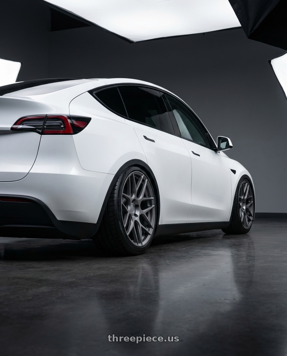 2024 Tesla Model Y with Aodhan AFF2 5x114.3 20x9+32 Matte Gray wheels rear three quarter view slight stretch tires