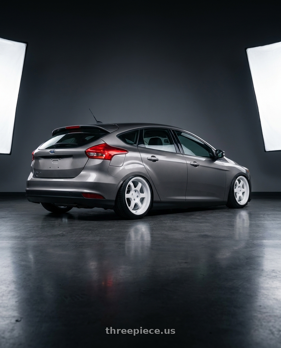 2017 Ford focus with 9six9 SIX-1 Deep 4x100 15X8 +20 Competition White wheels rear three quarter view slight stretch tires