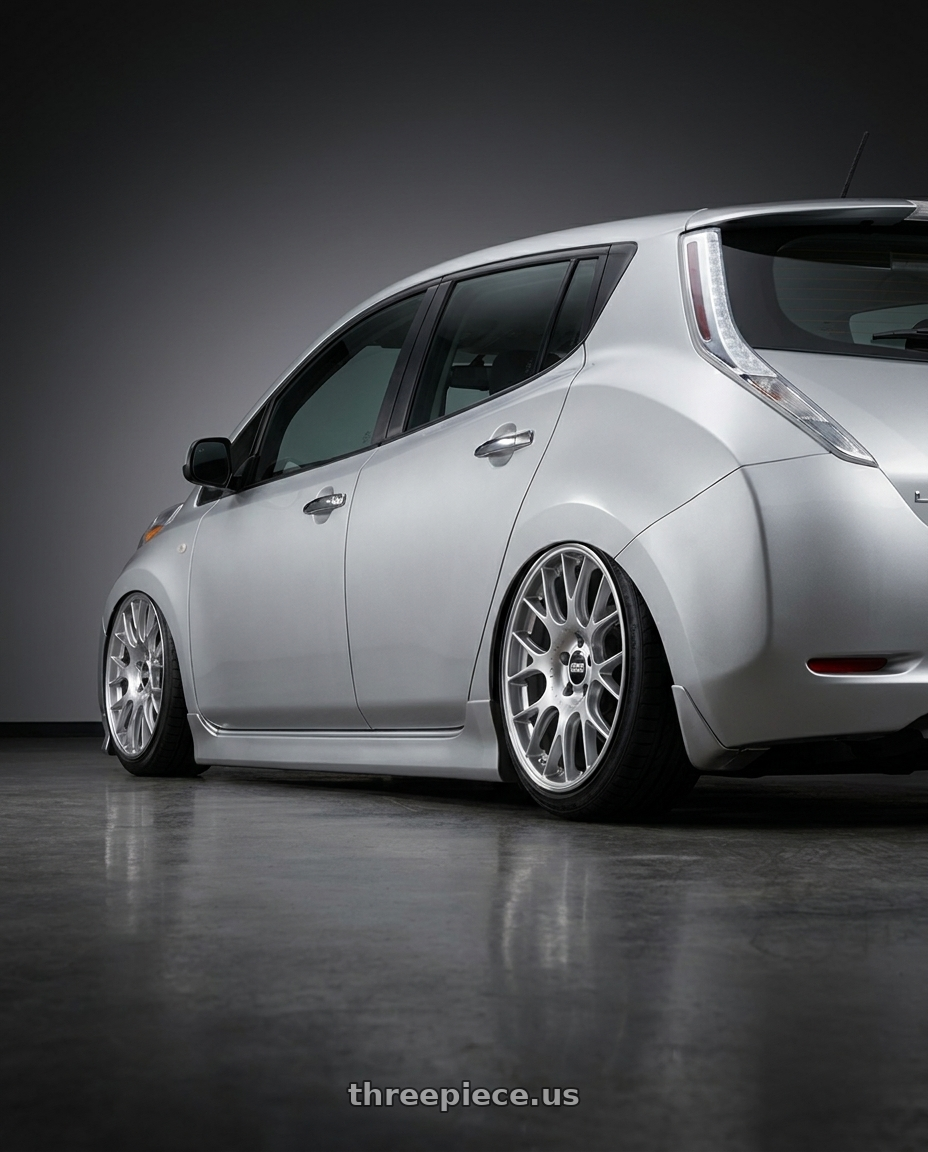 2017 Nissan leaf with BBS CH-R 5x112 18x8.5 +47 Brilliant Silver Polished Rim Protector wheels rear three quarter view slight stretch tires