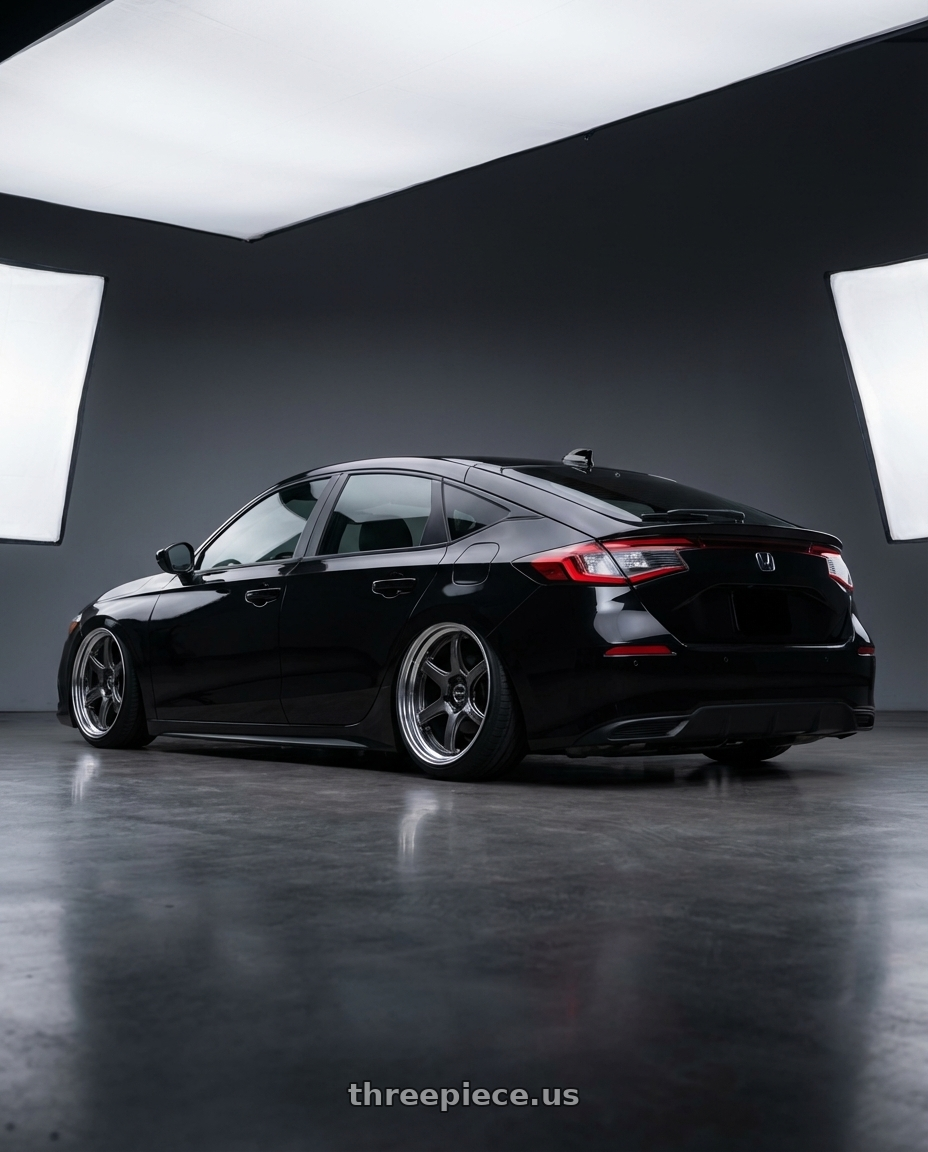 2026 Honda Civic Hatchback with Work Emotion T7R 2P wheels rear three quarter view slight stretch tires