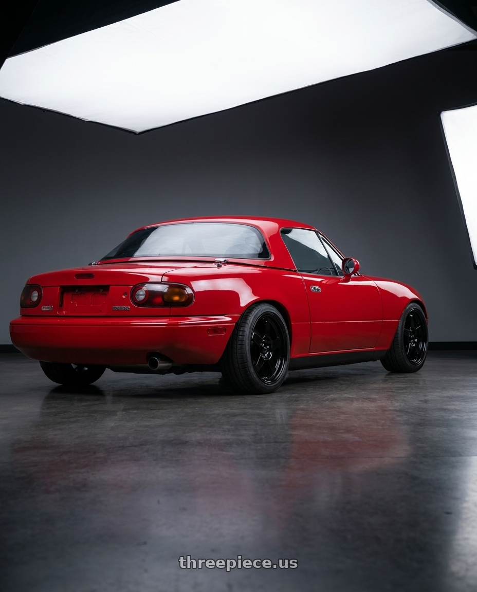 1993 Mazda Miata with Vors LT05 4x100 15x7  +40 Gloss Black wheels rear three quarter view square tires