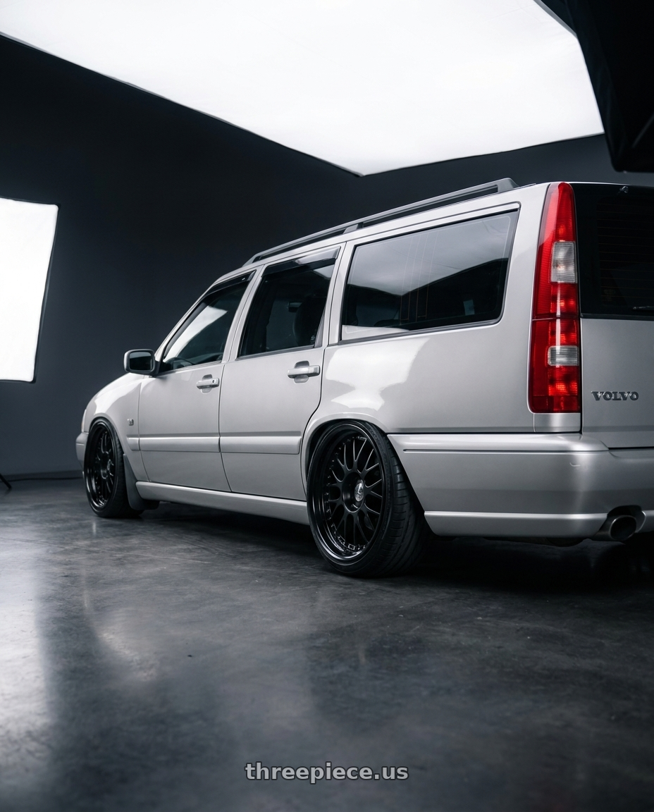1998 Volvo V70 with SSR Professor MS1R 5x108 17x7+37 NR Disk Black wheels rear three quarter view extreme stretch tires