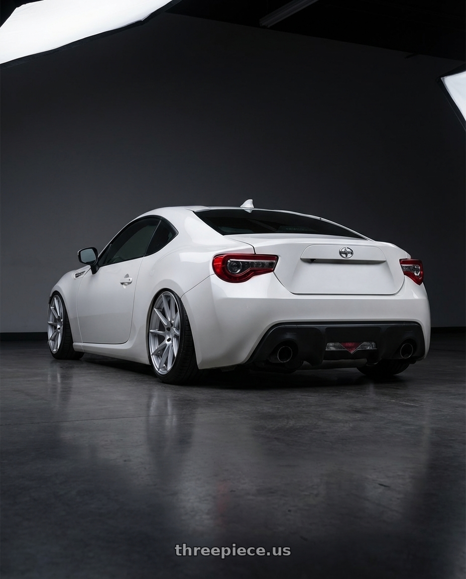 2016 Scion FR-S with Aodhan AH09 5x100 18x9.5 +35 Gloss Silver Machined Face wheels rear three quarter view slight stretch tires