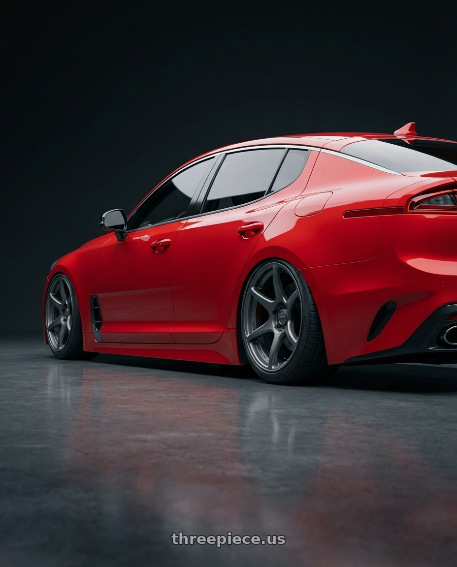 2022 Kia Stinger GT with Kansei K11G Tandem 5x114.3 19x9.5 22 Gunmetal wheels rear three quarter view slight stretch tires