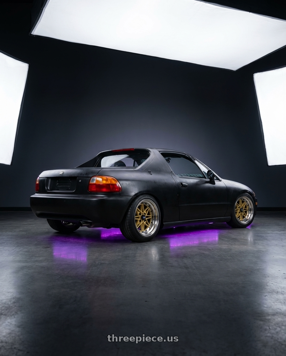 1993 honda del sol with WORK Equip 03 4x100 15x10.5 3 GOLD wheels rear three quarter view square tires