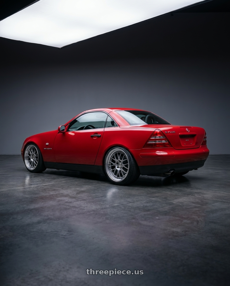 1998 Mercedes slk230 with SSR Professor MS3 5x112 18X8+-7 HP Disk Titan Silver wheels rear three quarter view slight stretch tires