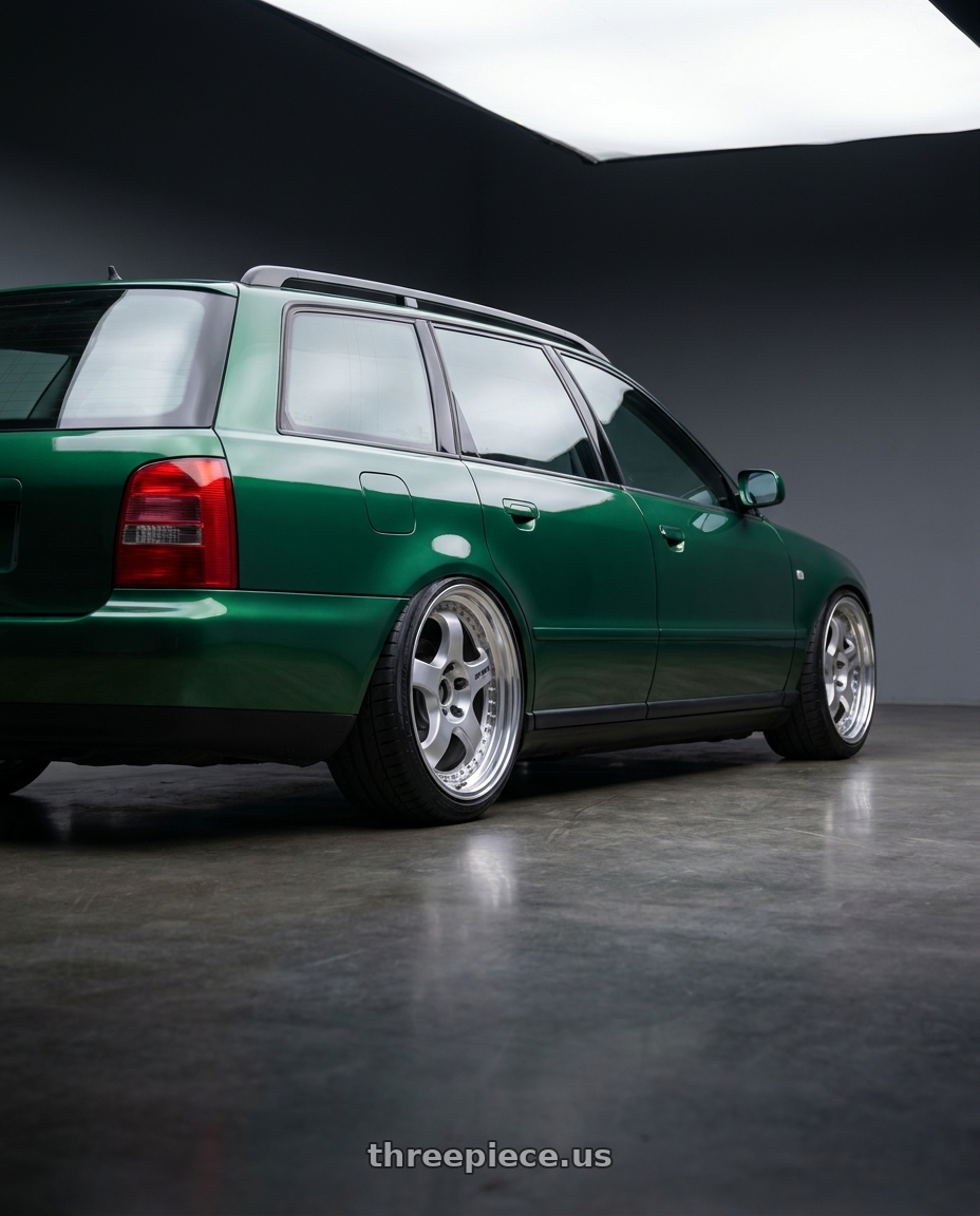 1999 audi a4 quattro avant with Work Meister S1 3P 5x112 17x7.5+42 W Disk Silver wheels rear three quarter view slight stretch tires