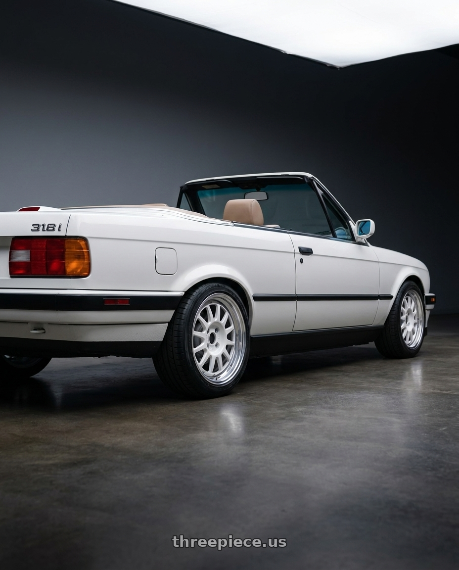 1992 BMW 318i with WedsSport Racing 2-Piece 4x100 15x7.0+35 White wheels rear three quarter view square tires