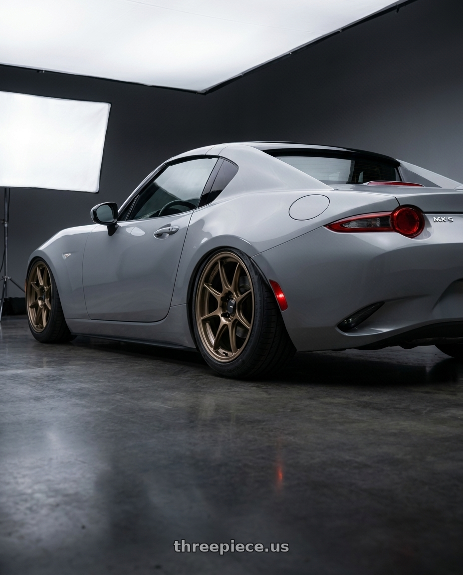 2025 mazda mx5 rf nd3 with Konig Dekagram 4x100 17x8+45 Gloss Bronze wheels rear three quarter view square tires