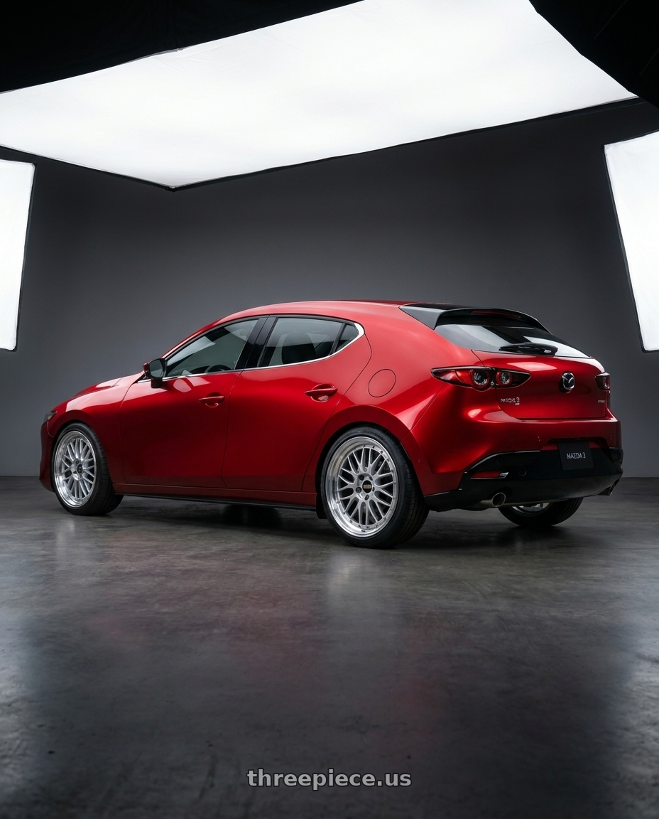2024 Mazda 3 with BBS LM 5x114.3 19x9.0+38 Diamond Silver wheels rear three quarter view slight stretch tires