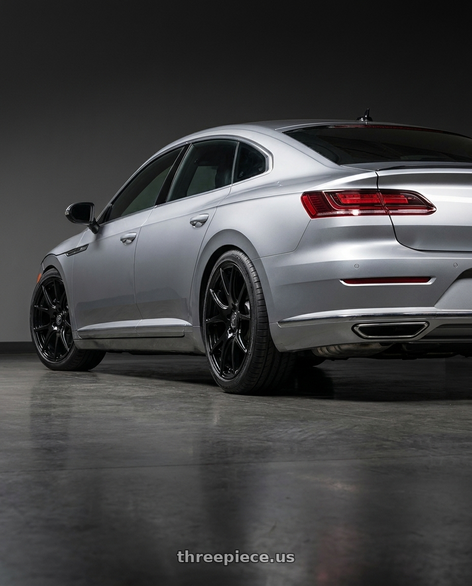 2020 Volkswagen Arteon with Forgestar CF5V 5x112 18x8.5 +35 Gloss Black wheels rear three quarter view square tires