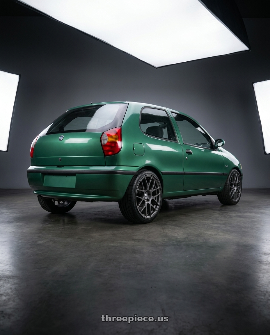 1997 fiat palio with TSW NURBURGRING 5X114.3 17X7.5 +45 MATTE GUNMETAL wheels rear three quarter view square tires