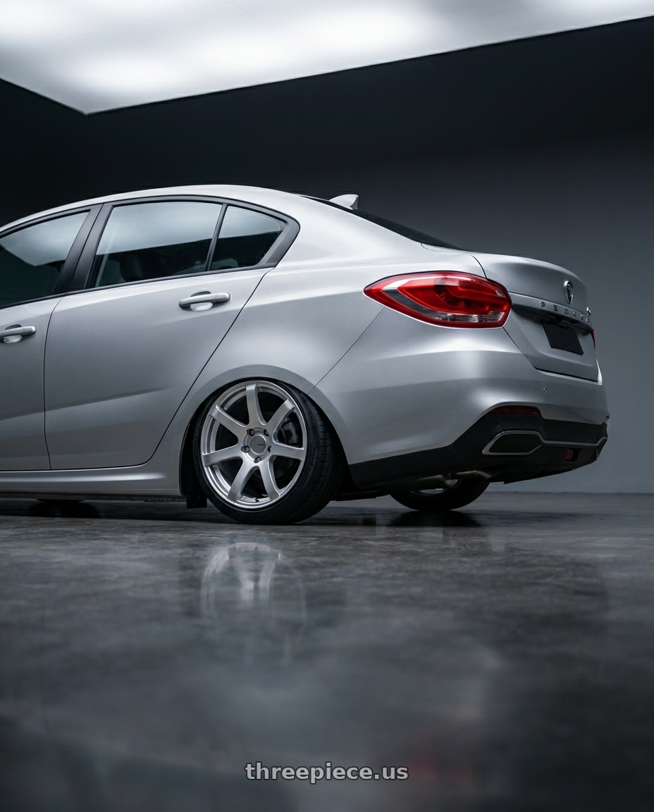 2021 Proton persona mc2 with Enkei PF07 5x114.3 17x8+35 Silver wheels rear three quarter view slight stretch tires