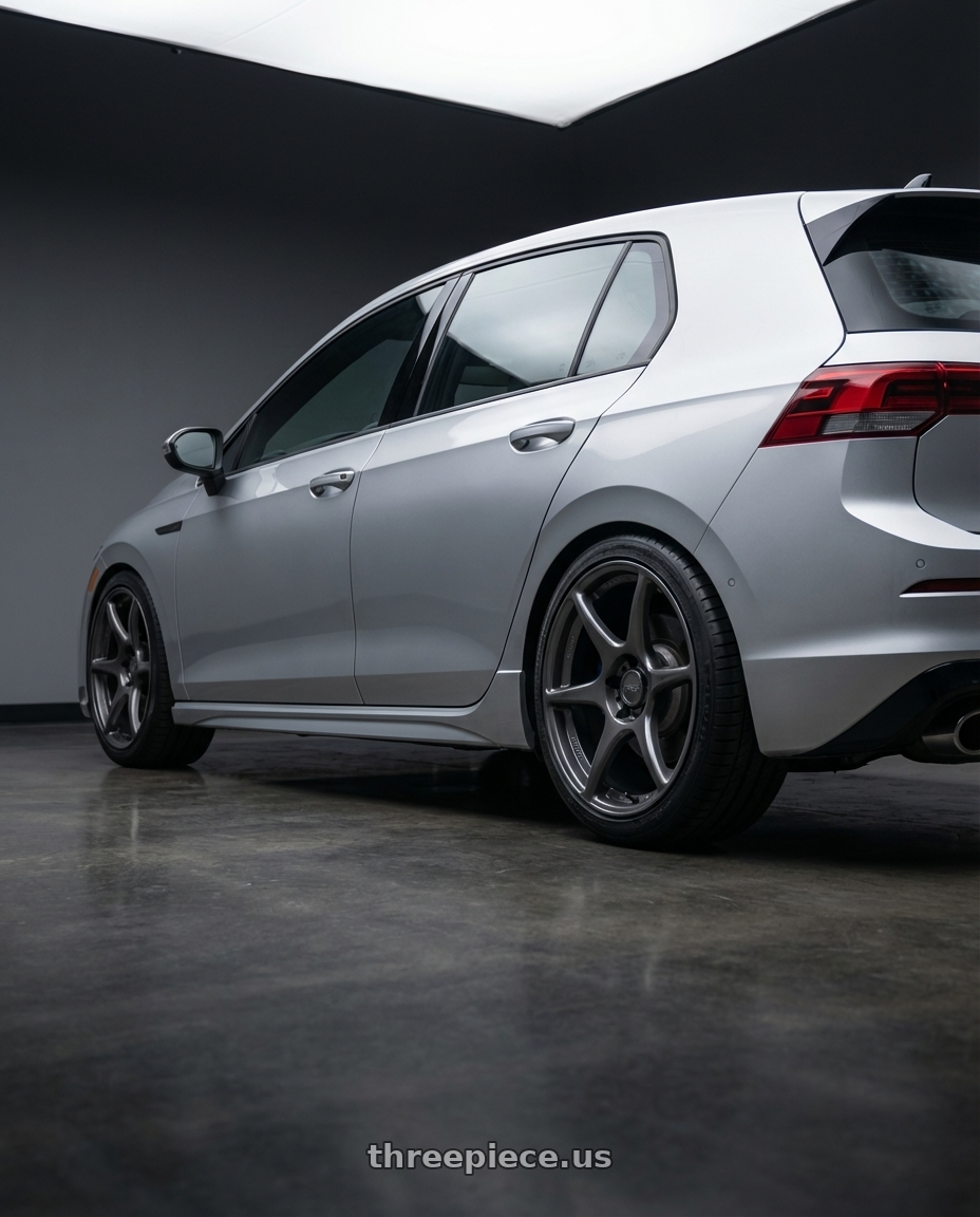 2024 Volkswagen Golf R MK8 with Kansei K11G Tandem 5X112 19x9.5 22 Gunmetal wheels rear three quarter view square tires