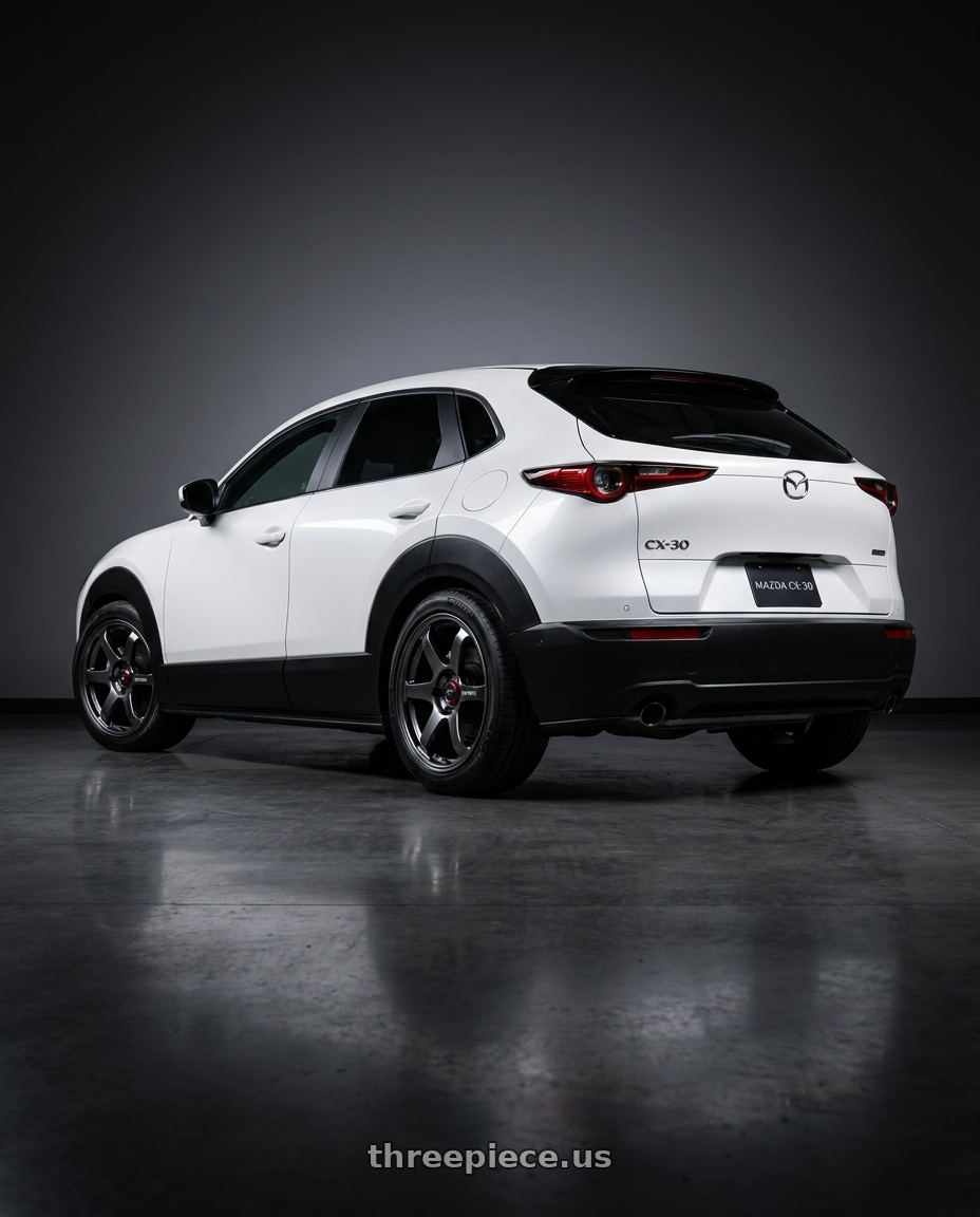 2024 Mazda CX-30 with Enkei PF06 5x114.3 18x9.5+40 Black Machined wheels rear three quarter view slight stretch tires