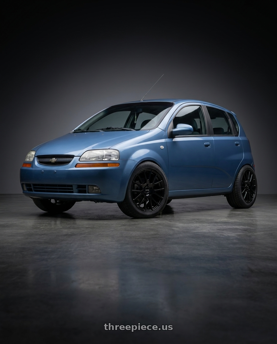 2005 Chevy Aveo with Vision Street-Designs 18 Hellion 4x100 14x5.5+38 Gloss Black wheels