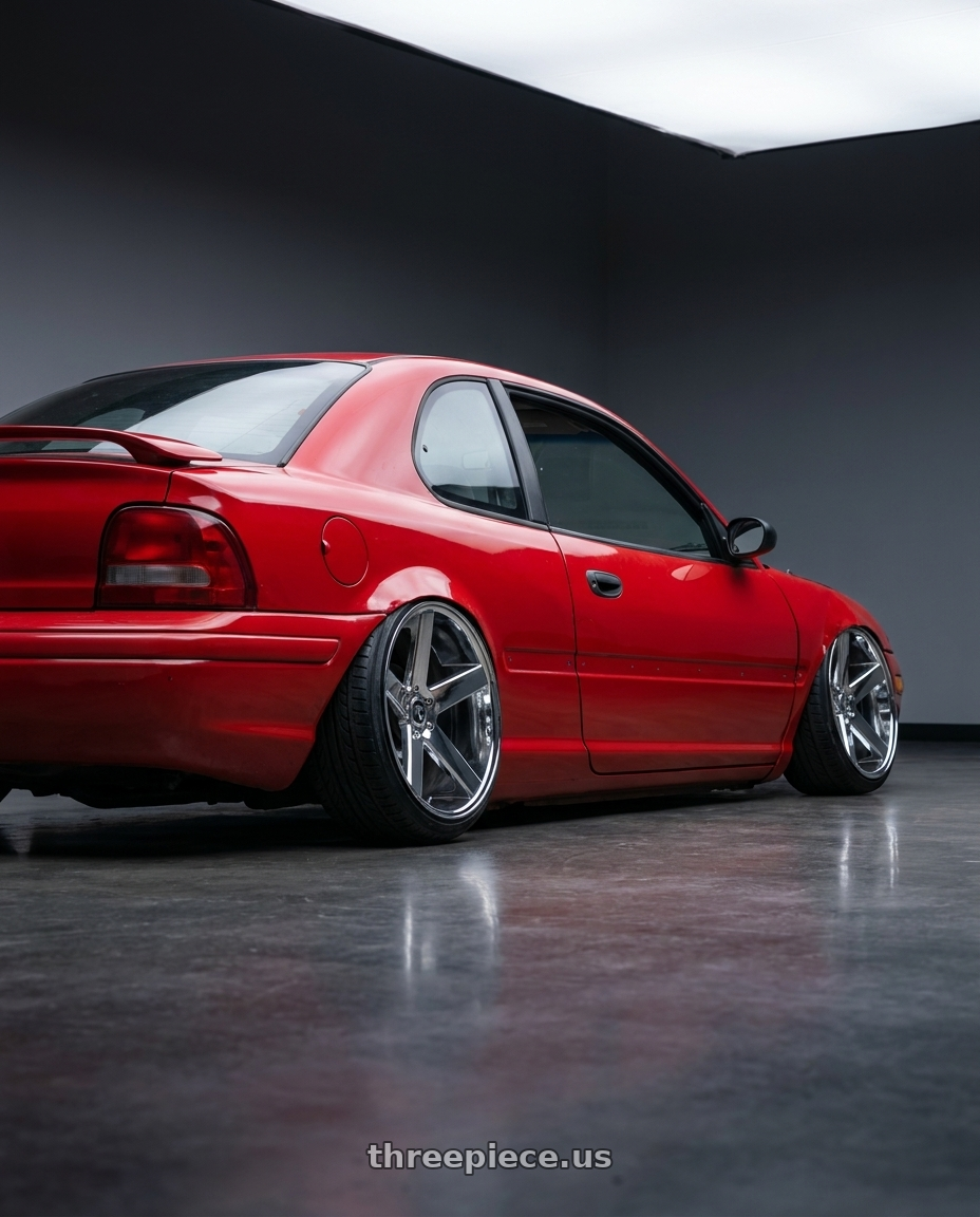 1995 Dodge Neon Coupe with DUB 1PC S115 BALLER 5X114.3 22X8.5 +38 CHROME PLATED wheels rear three quarter view extreme stretch tires
