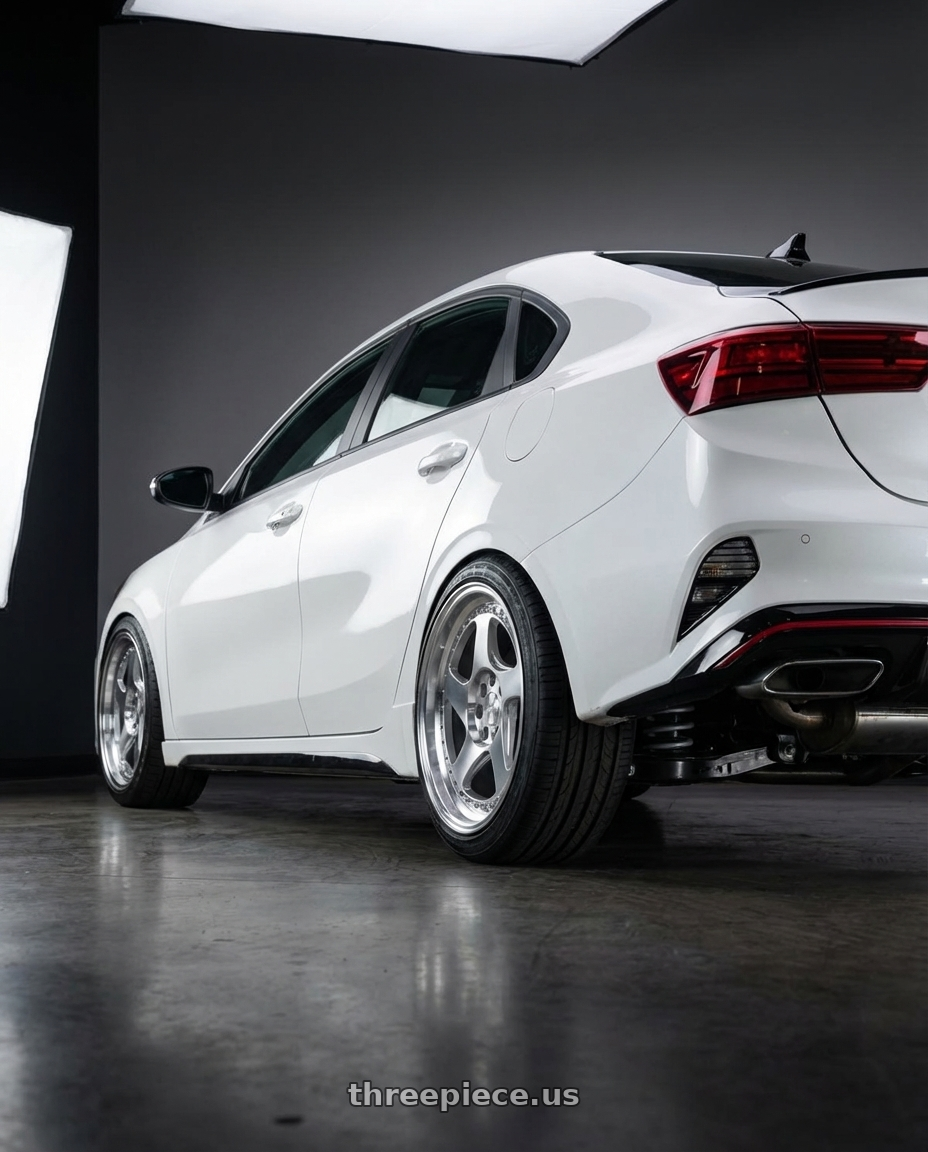 2023 kia forte gt with Aodhan AH01 5x114.3 18x9.5+30 Silver w/Machined Face wheels rear three quarter view slight stretch tires