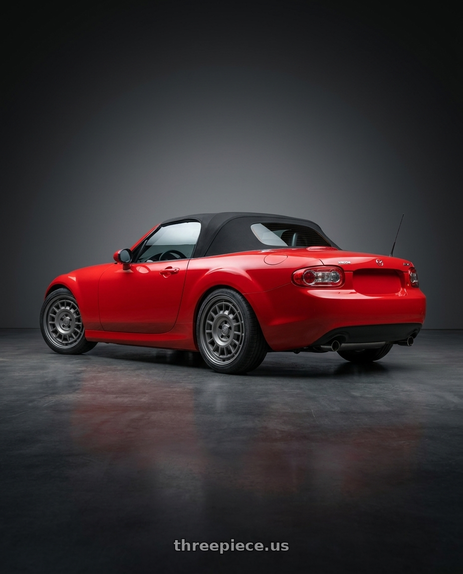 2012 Mazda MX-5 Miata NC with fifteen52 ALPEN MX 5x114.3 17x8 +38 FROSTED GRAPHITE (SATIN GREY) wheels rear three quarter view square tires