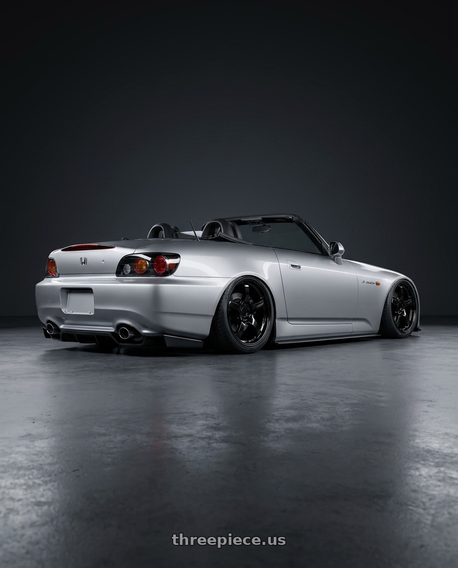 2009 Honda S2000 with Gram Lights 57CR 5x114.3 17x9+22 Glossy Black wheels rear three quarter view slight stretch tires