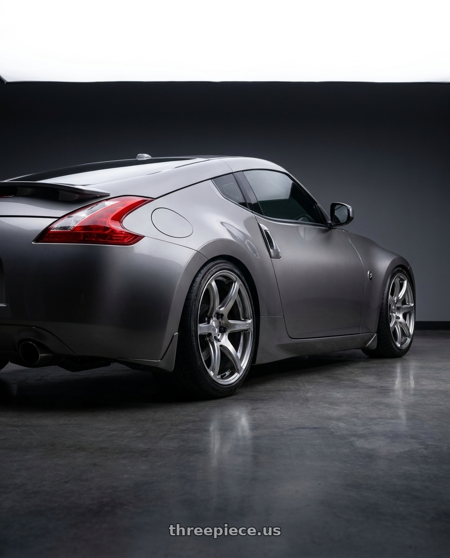 2009 Nissan 370z with Work Emotion T7r 5x100 19x10.5 +22 Gt Silver wheels rear three quarter view square tires