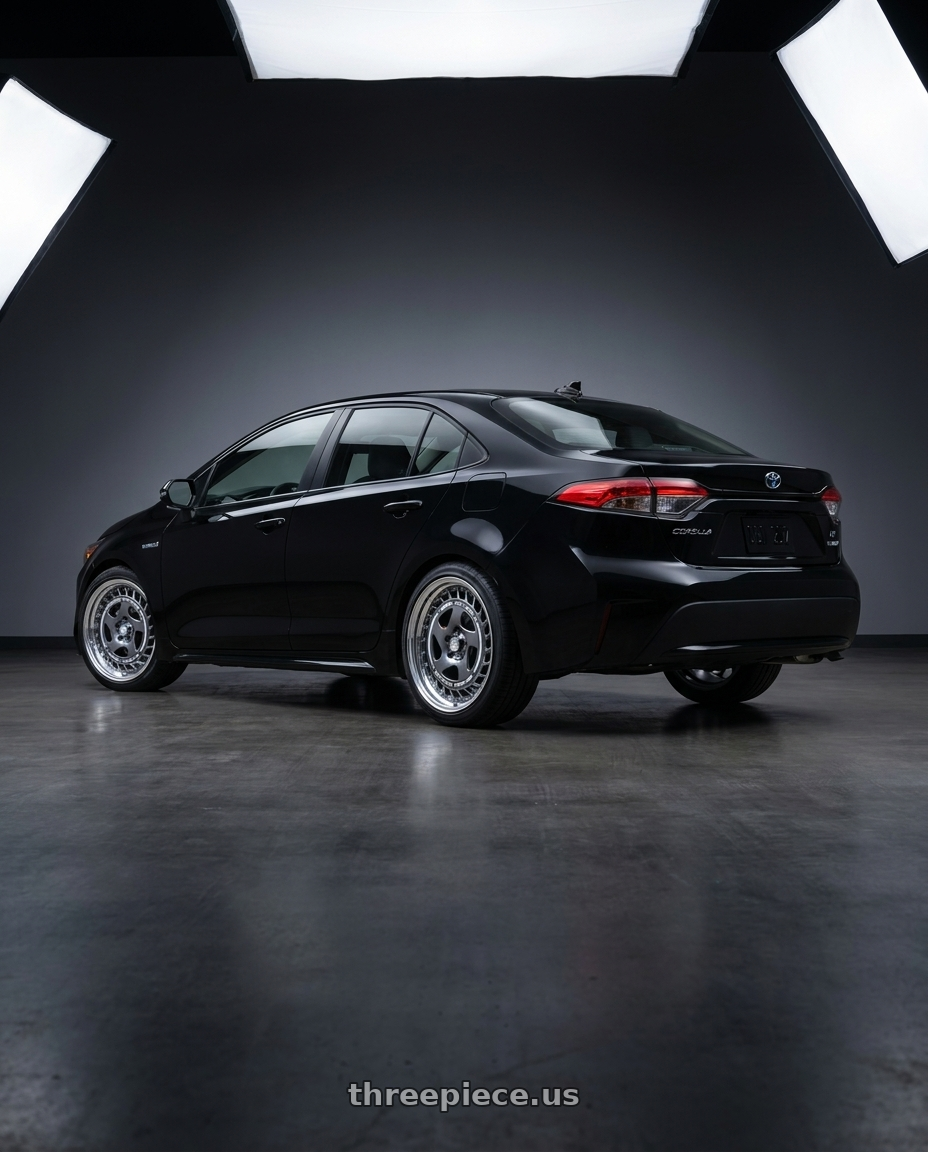 2026 Toyota Corolla le hybrid  with FORMULA AERO SPOKE 5X100 18X7.5+43 SL Disk Titan Silver wheels rear three quarter view square tires