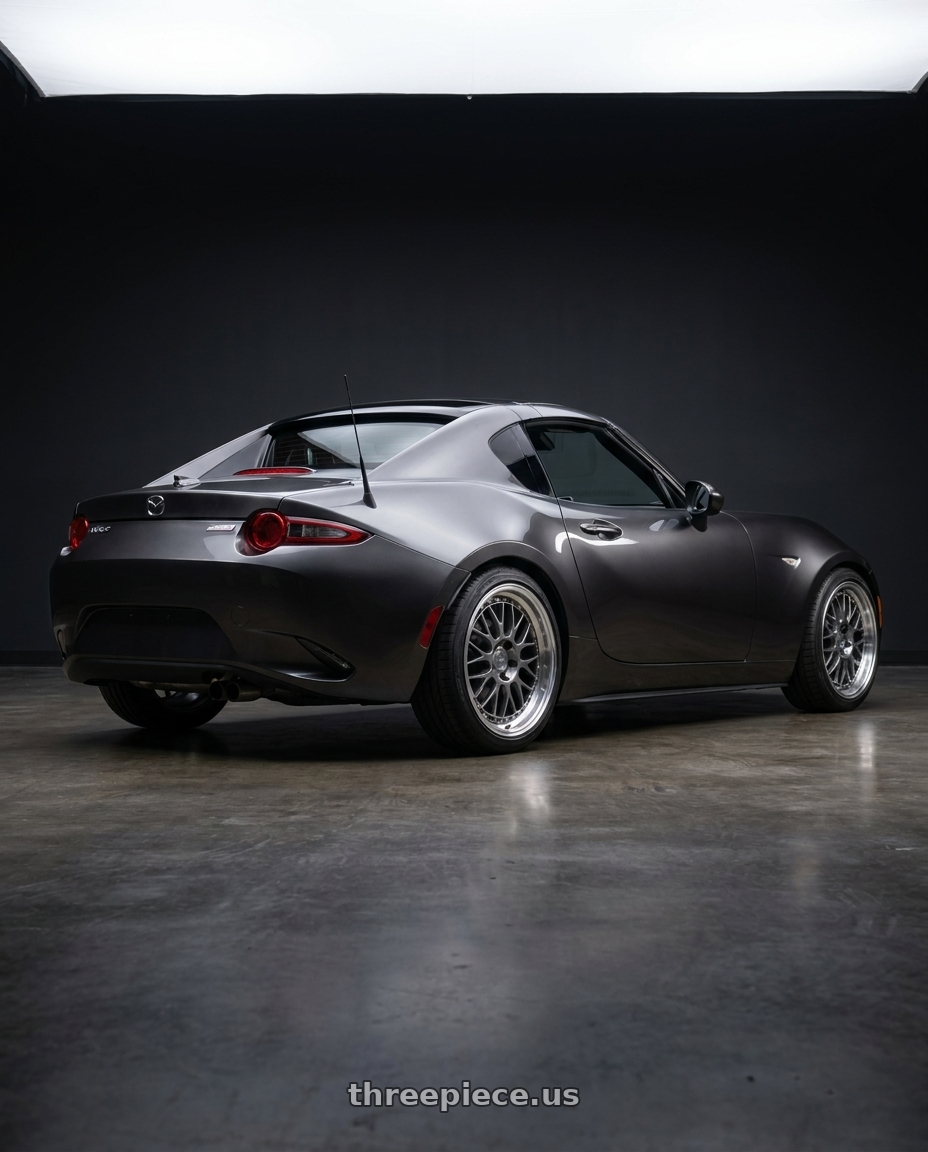 2017 Mazda mx5 RF with Aodhan AH02 4x100 / 4x114.3 17x8+35 Hyper Black w/ Machined Lip wheels rear three quarter view slight stretch tires