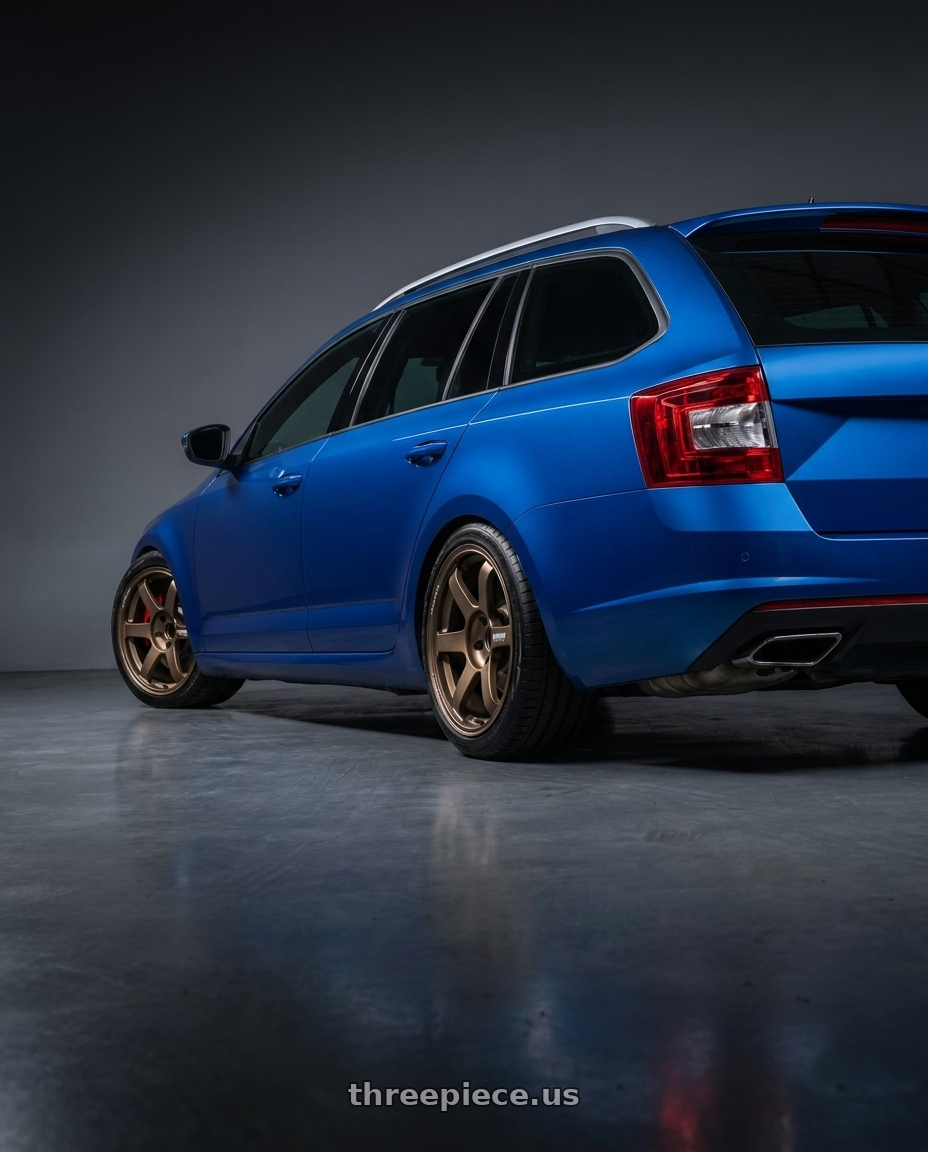 2017 Skoda octavia with Volk Racing TE37 Saga S-Plus 5x112 18x8.5+42 Bronze wheels rear three quarter view square tires
