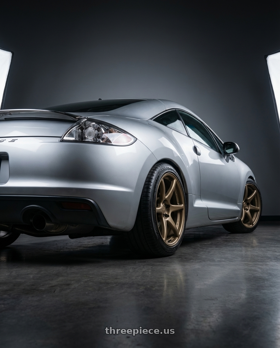 2010 Mitsubishi Eclipse with Kansei K11B Tandem 5x114.3 18x9 12 Bronze wheels rear three quarter view square tires