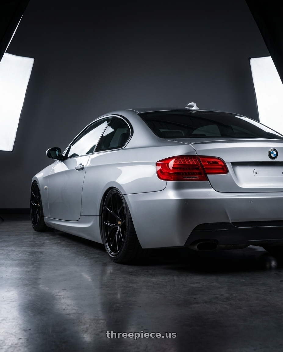 2012 BMW 3 Series E92 with BBS FI-R 5x120 19x10.5+35 Satin Black wheels rear three quarter view slight stretch tires