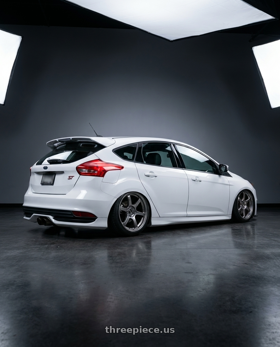 2015 ford focus st white with Gram Lights 57DR 5x108 18x8.5 +37 HS GUNMETALLIC wheels rear three quarter view slight stretch tires