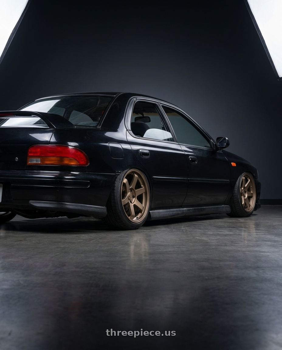 1998 Subaru Impreza GC8 with F1R F106 5x100 18x8.5 +35 Matte Bronze wheels rear three quarter view slight stretch tires