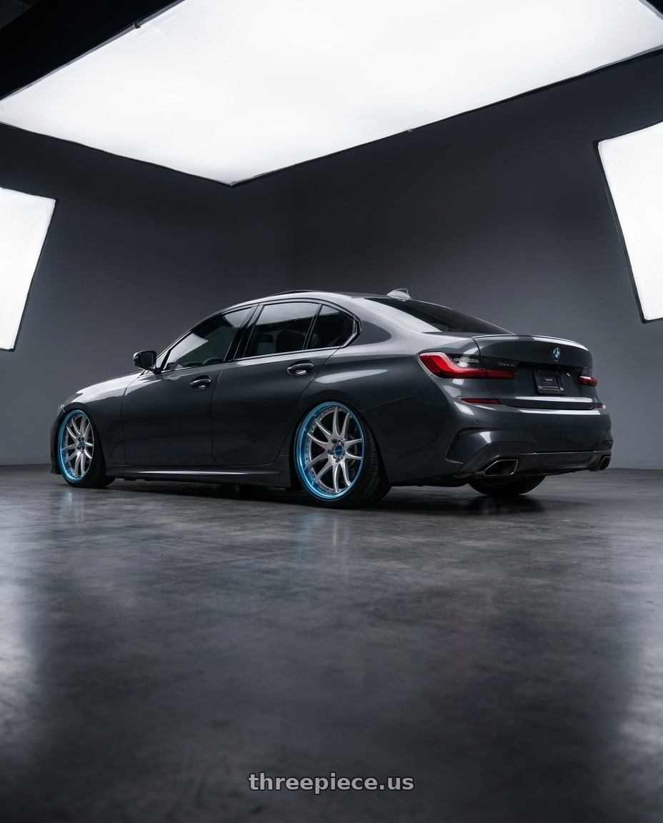 2026 bmw g20 330i with Work Emotion CR 3P wheels rear three quarter view slight stretch tires