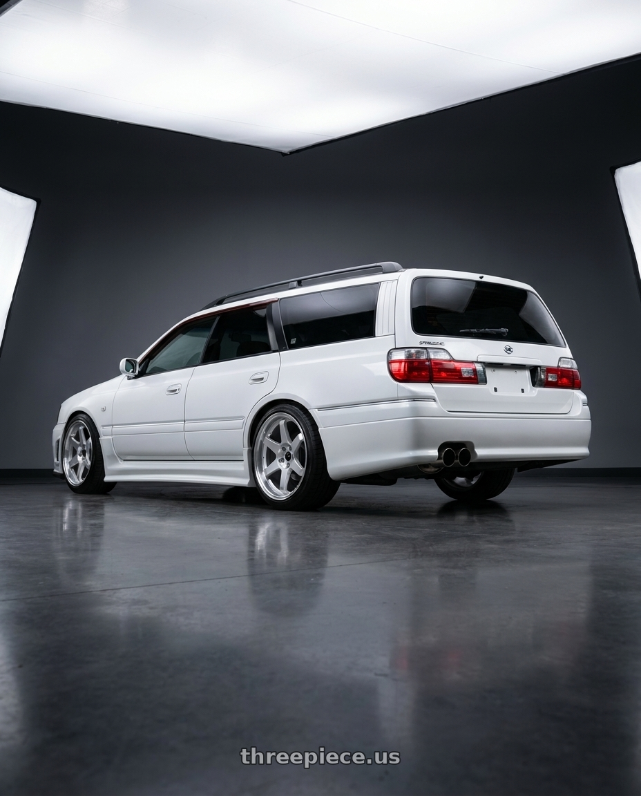 2000 Nissan stagea  with Vors TR37 5x112 18x8.5  +35 Silver Machine Face Lip wheels rear three quarter view square tires