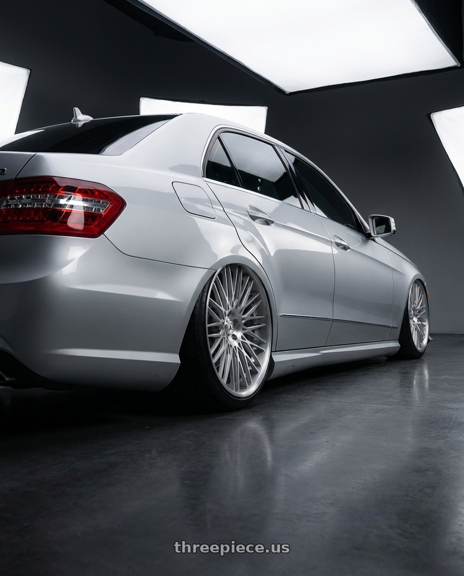 2012 Mercedes E550 with Asanti Forged CX857 5x120 22x9 +30 Brushed wheels rear three quarter view extreme stretch tires
